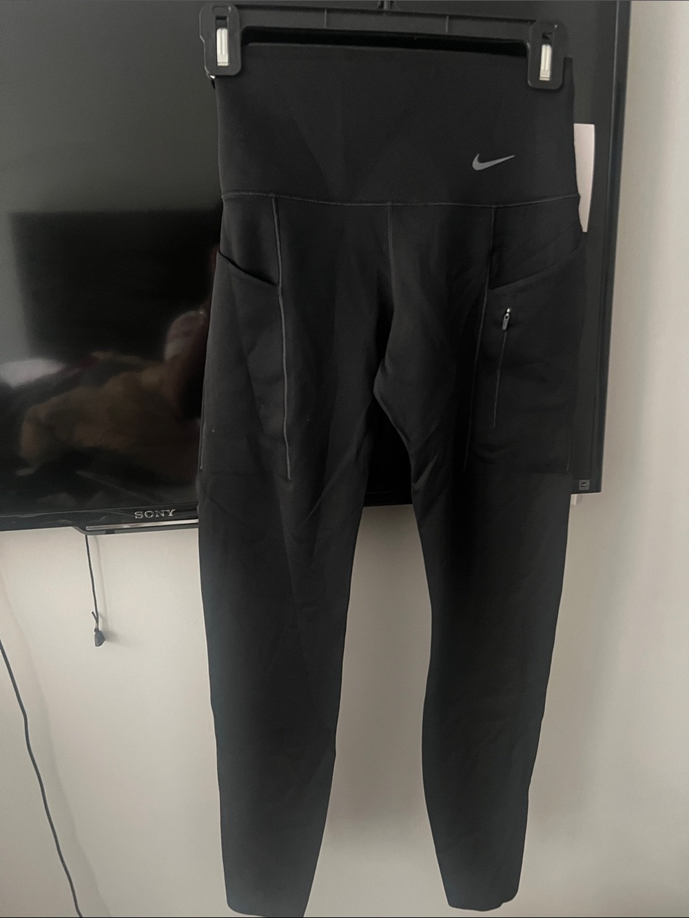 Nike Black Tapered High-Waist Leggings with Side Pockets